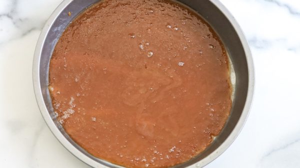 step-6-pour-the-caramel-in-the-pan-1726255117